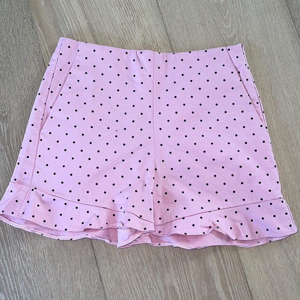 Pink and black polka dot shorts